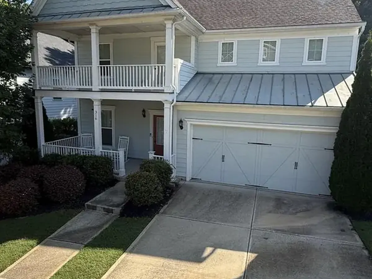 House and driveway before cleaning
